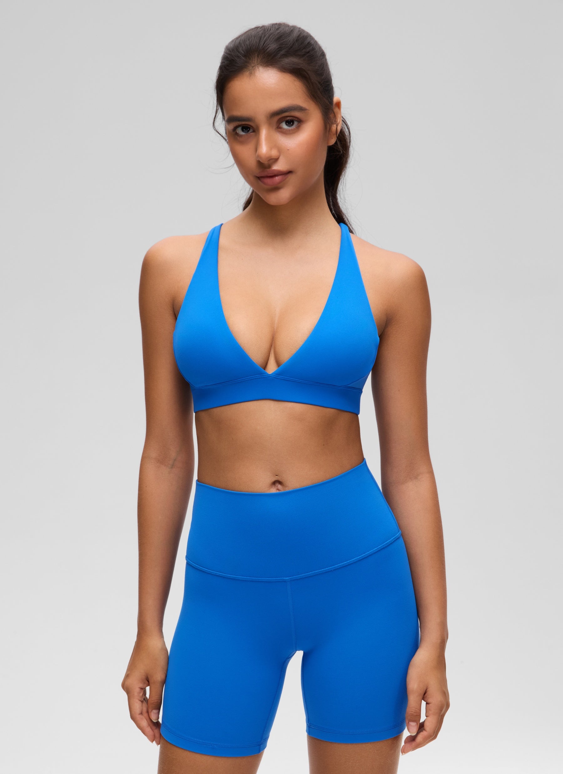 CRZ YOGA Sujetador Criss Cross con Tirantes Finos y Cuello en V Profundo Azul Destello