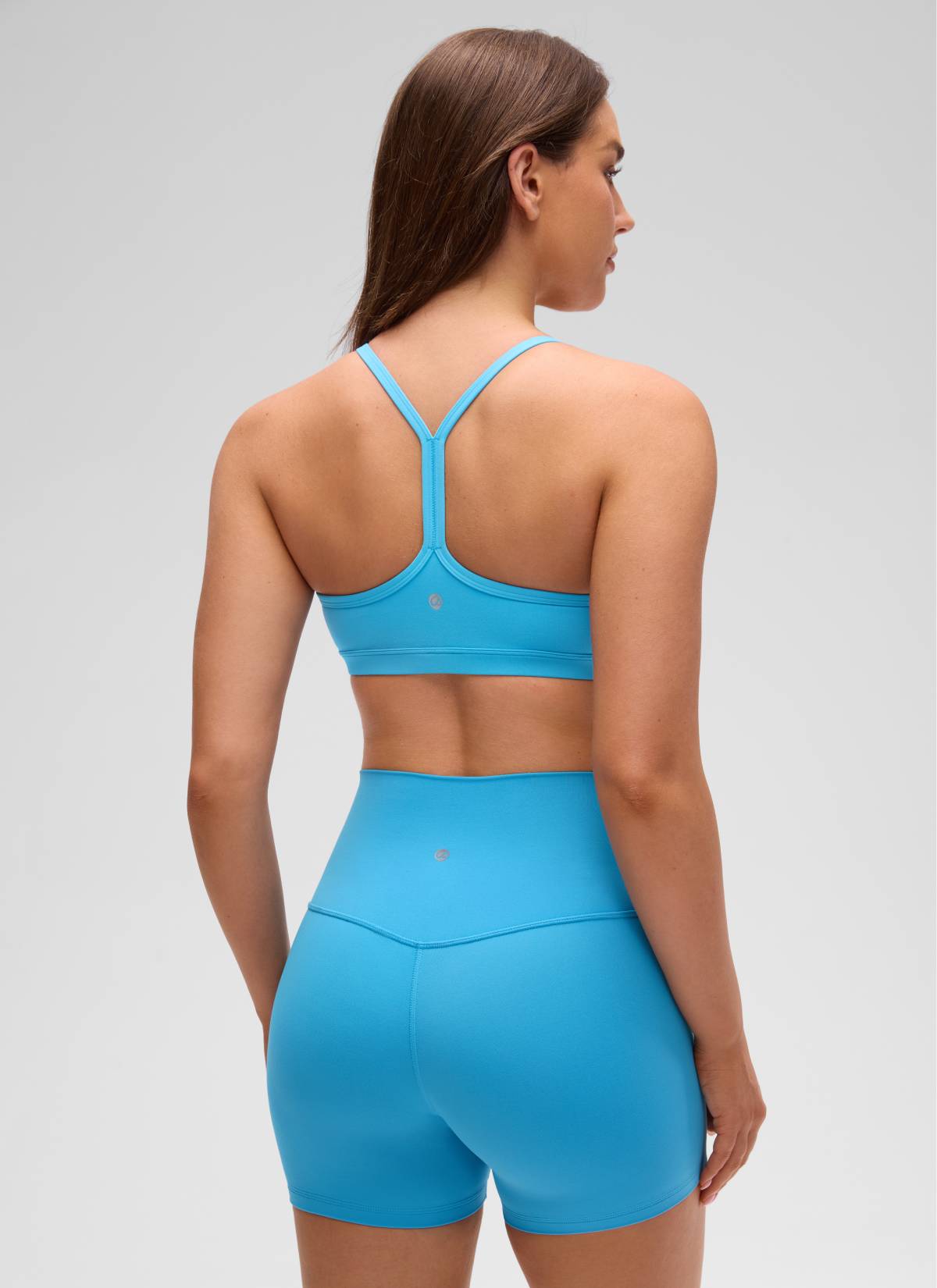 CRZ YOGA Sujetador Deportivo con Acolchado y Ruched en V para Mujer Kayak Azul
