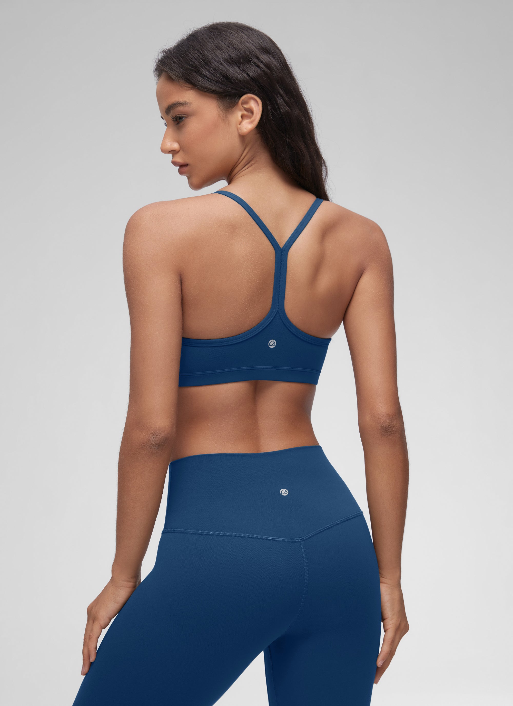 CRZ YOGA Sujetador Deportivo con Acolchado y Ruched en V para Mujer MARFIL FRANCÉS