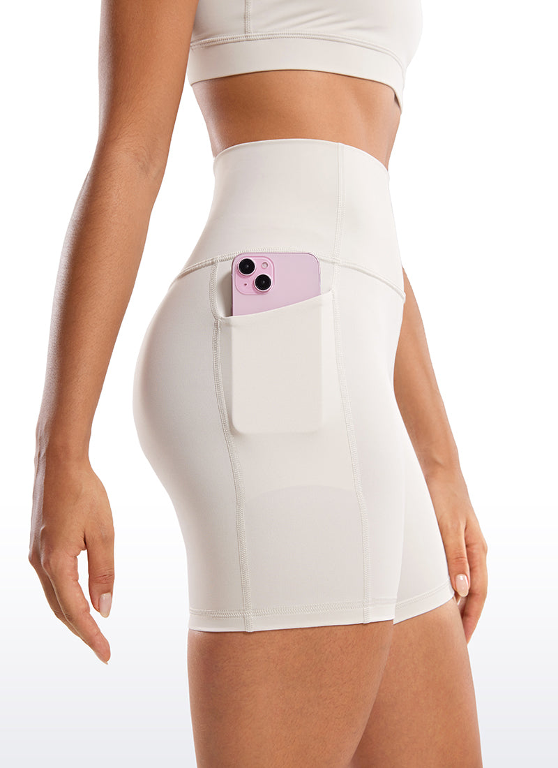 CRZ YOGA Nakedfeel Leggings Cortos con Bolsillos de 6 Pulgadas para Mujer Blanca Lechosa