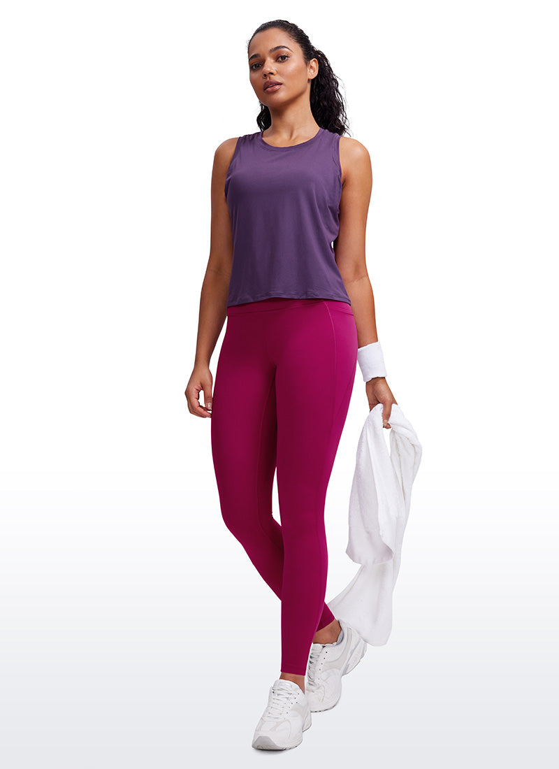 CRZ YOGA Mujer Leggings Deportivos con bolsillos de 28 Pulgadas Magenta Púrpura