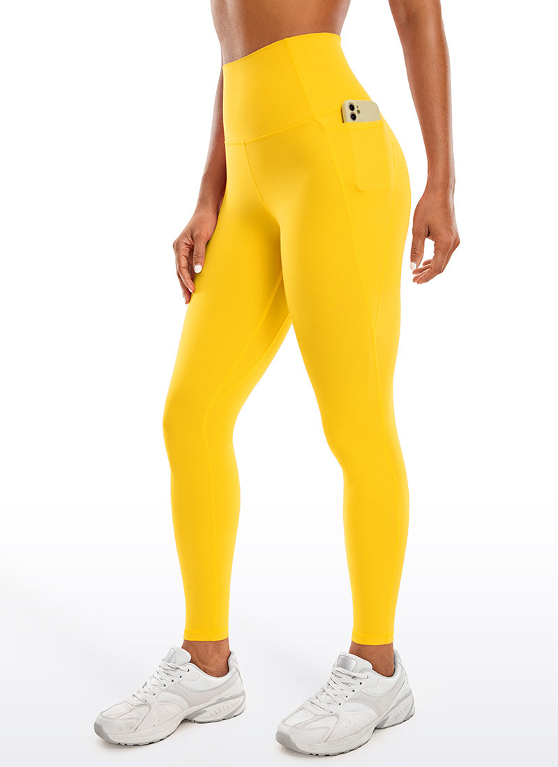 CRZ YOGA Mujer Leggings Deportivos con bolsillos de 28 Pulgadas Amarillo Alta Visibilidad