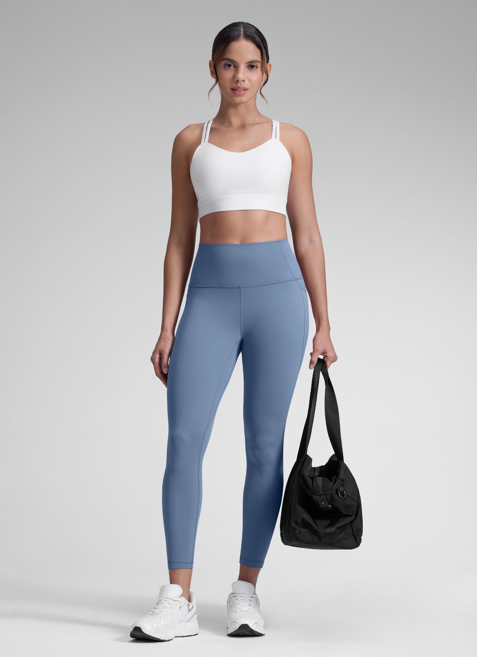 CRZ YOGA Mujer Leggings Deportivos con bolsillos de 28 Pulgadas Denim lavado