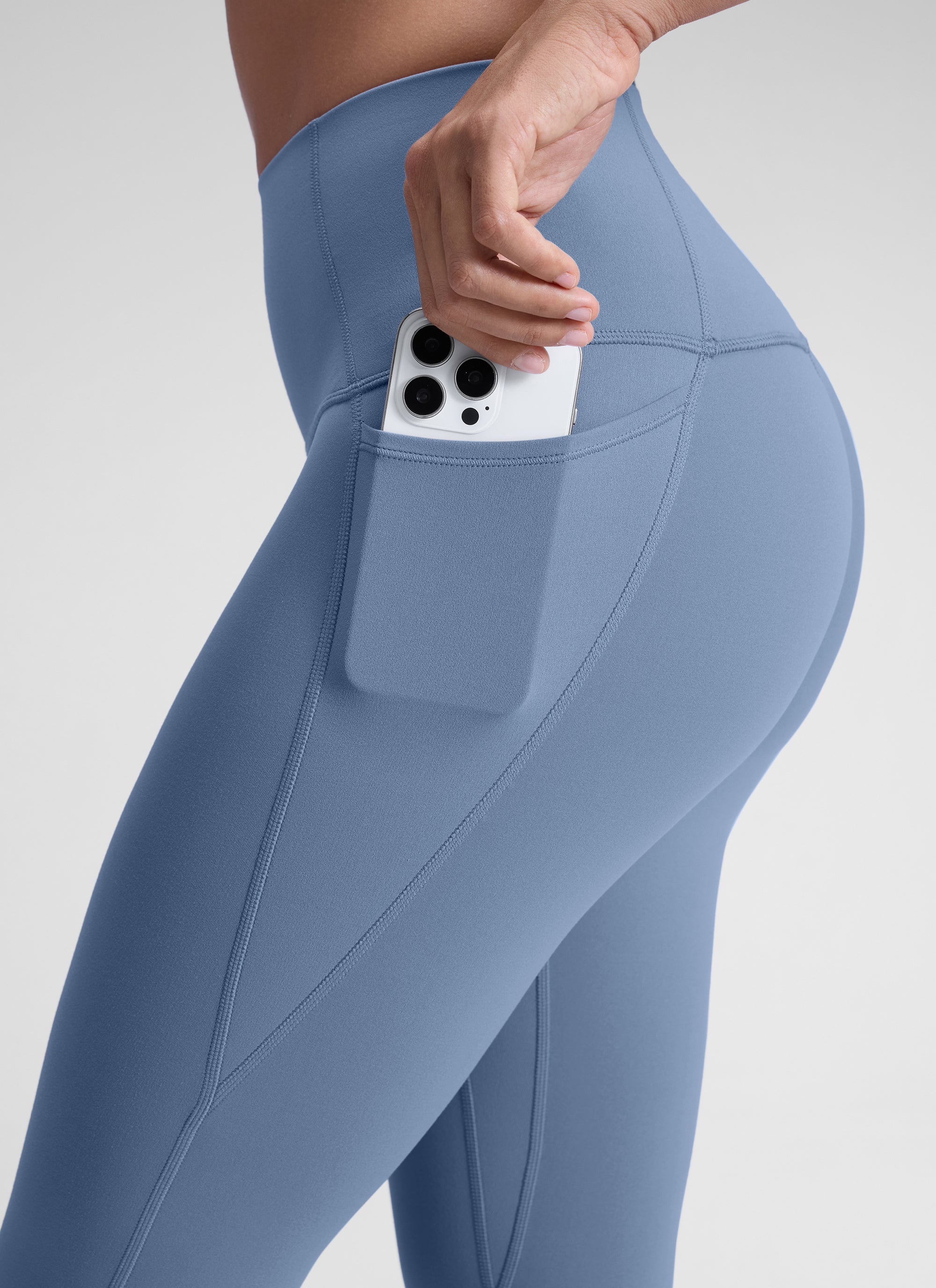 CRZ YOGA Mujer Leggings Deportivos con bolsillos de 28 Pulgadas Denim lavado
