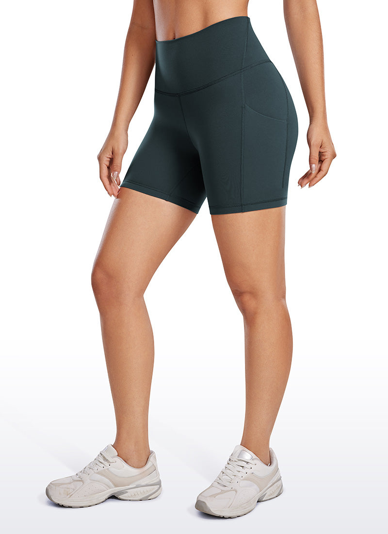 CRZ YOGA Butterluxe Leggings Cortos con Bolsillos de 5 Pulgadas para Mujer Verde oscuro del bosque