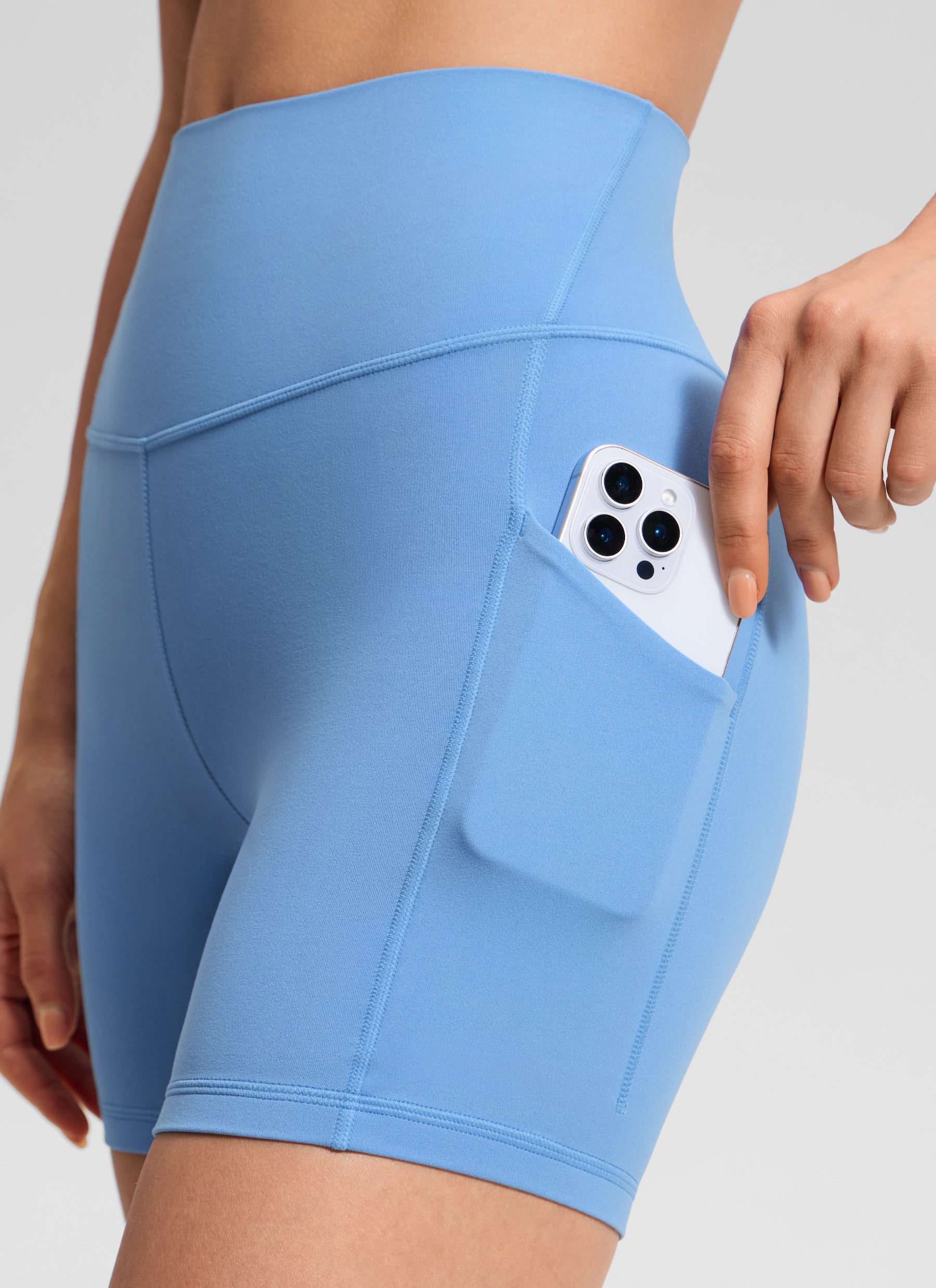 CRZ YOGA Butterluxe Leggings Cortos con Bolsillos de 5 Pulgadas para Mujer Fiesta Azul