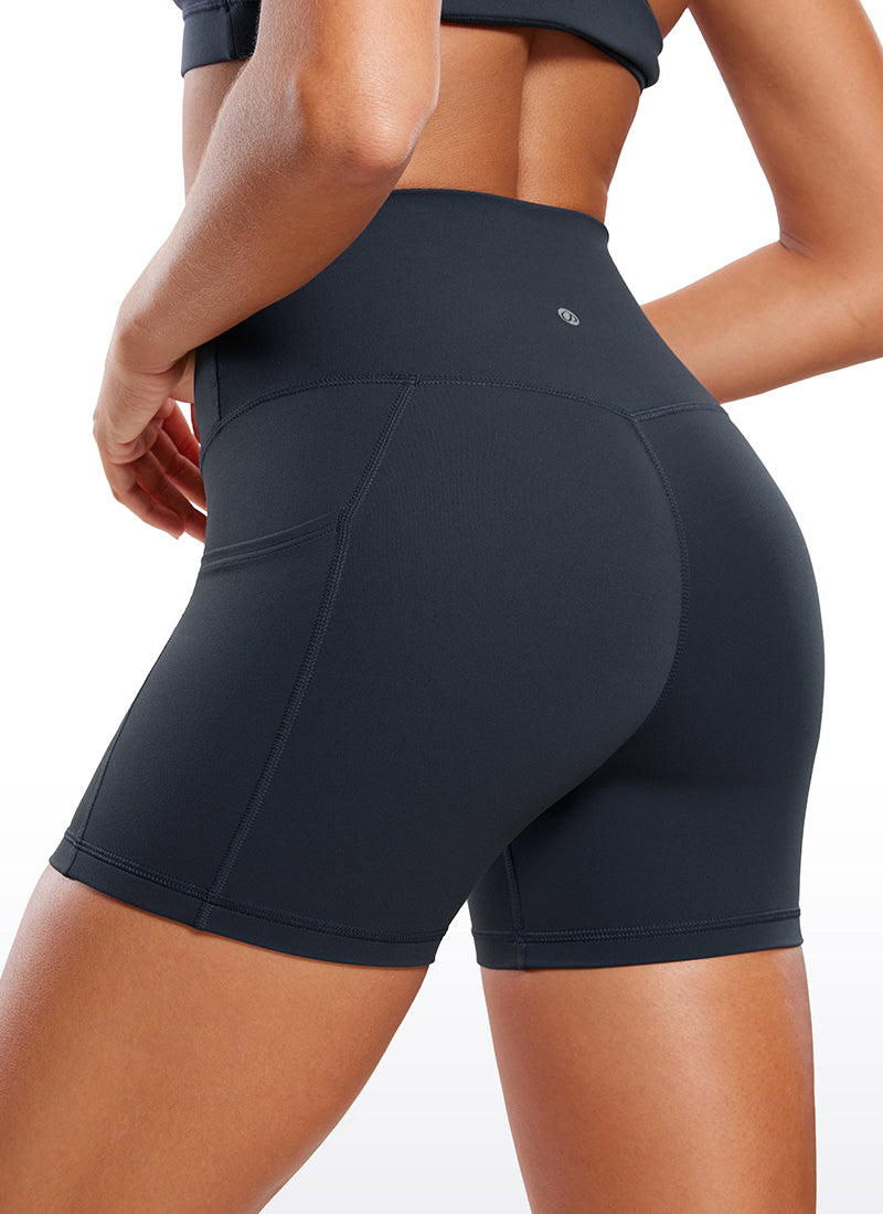 CRZ YOGA Mujeres Shorts V Cross con Bolsillos Alta Cintura de 4 pulg. True Navy