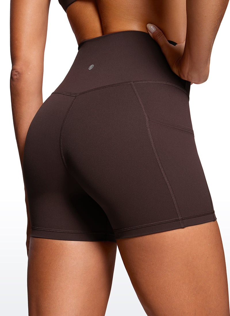 CRZ YOGA Mujeres Shorts V Cross con Bolsillos Alta Cintura de 4 pulg. Marrón Fudge Caliente
