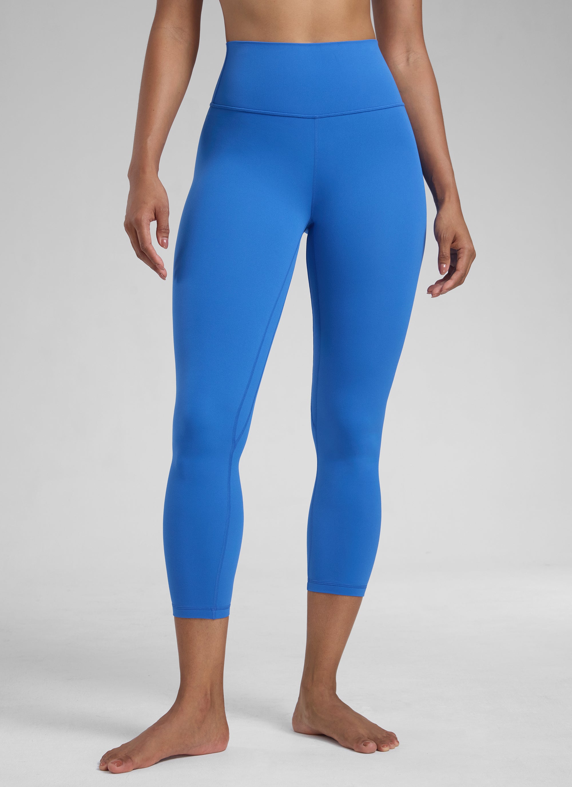 CRZ YOGA Leggings de Mujer Cintura Alta Capris para Ejercicio 23 Pulgadas Azul Destello