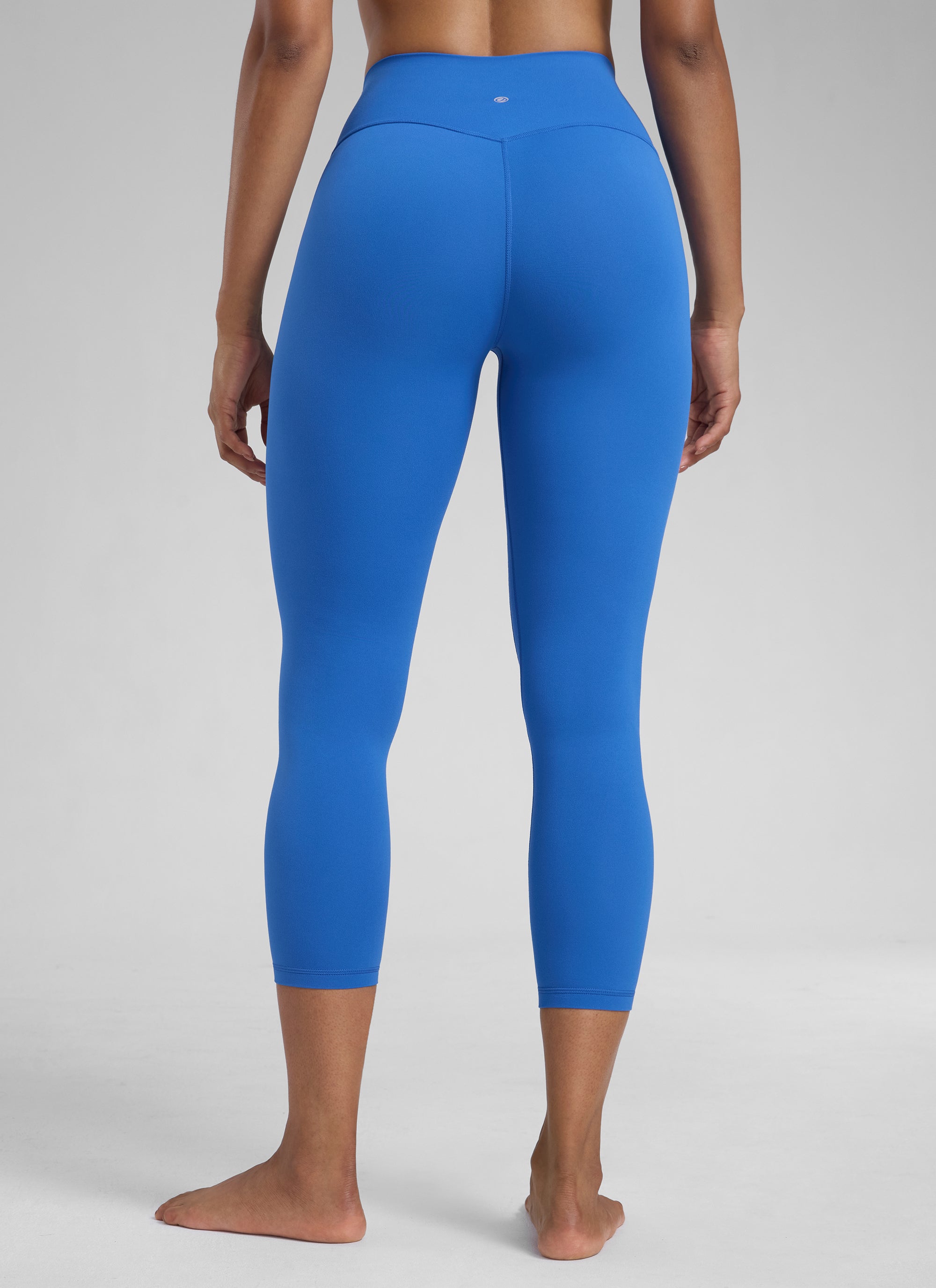 CRZ YOGA Leggings de Mujer Cintura Alta Capris para Ejercicio 23 Pulgadas Azul Destello