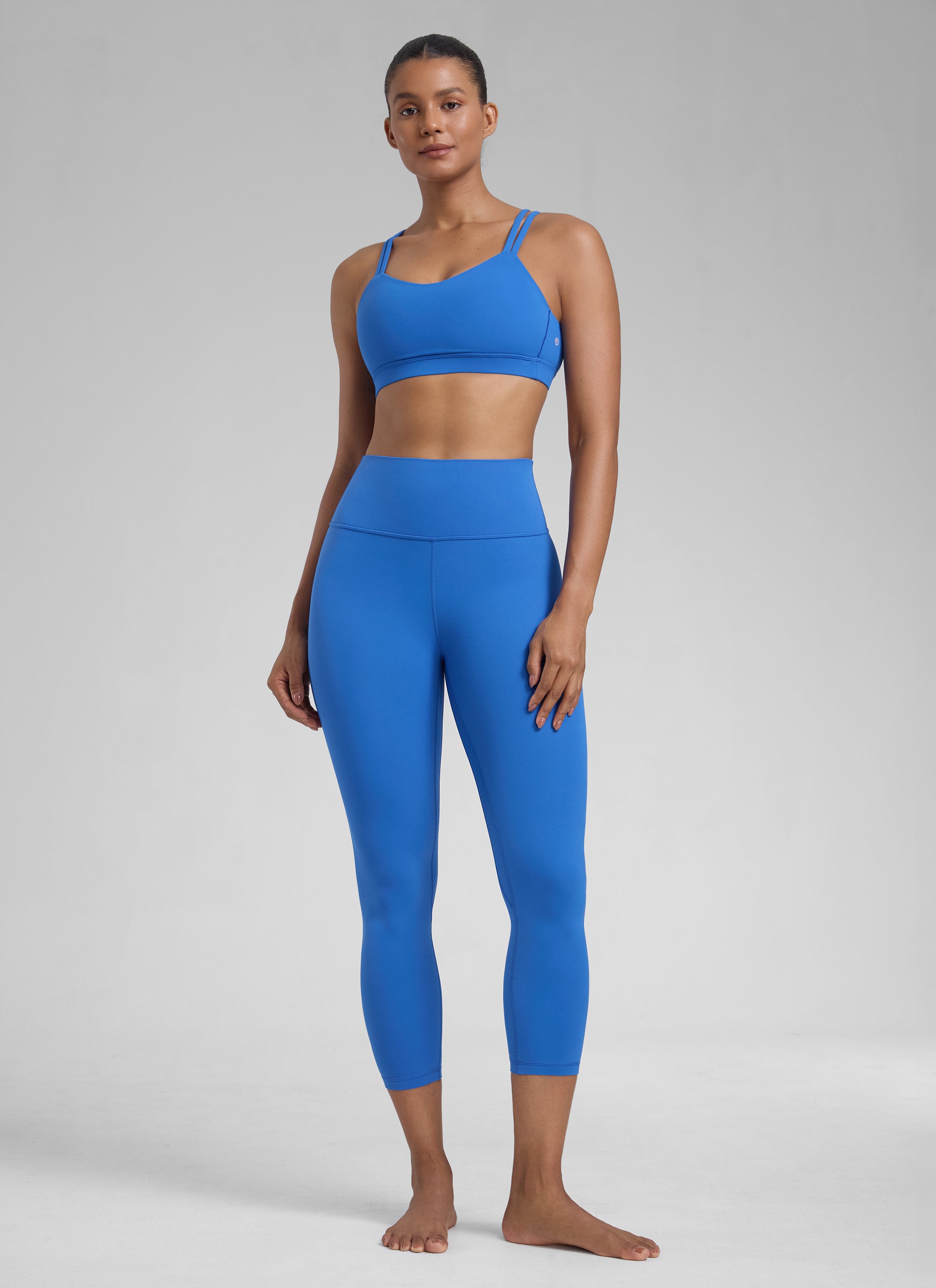 CRZ YOGA Leggings de Mujer Cintura Alta Capris para Ejercicio 23 Pulgadas Azul Destello