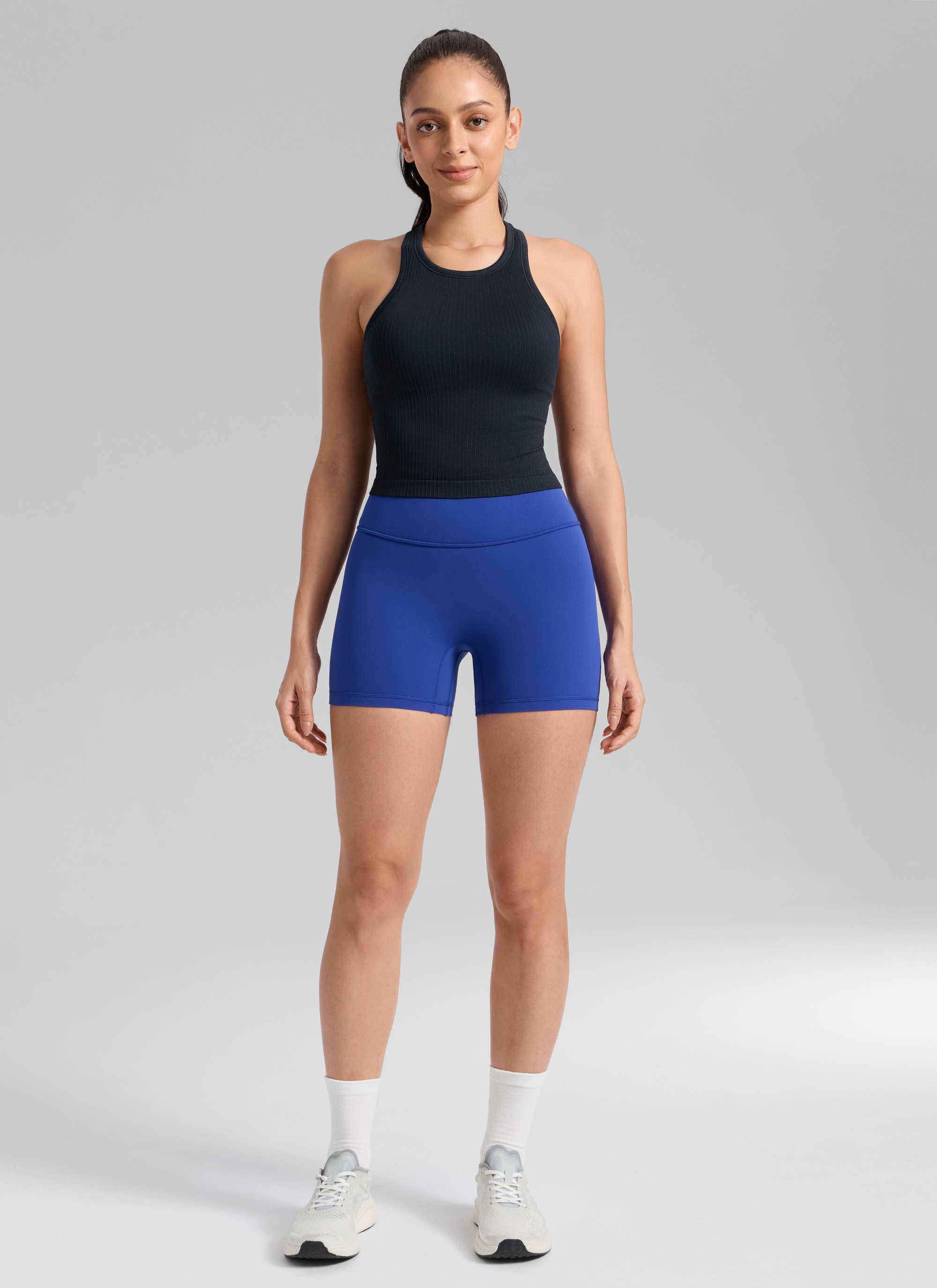 CRZ YOGA  Butterlift Leggings Cortos con el Culo Esreujado de 4 Pulgadas para Mujer Azul Ondulante