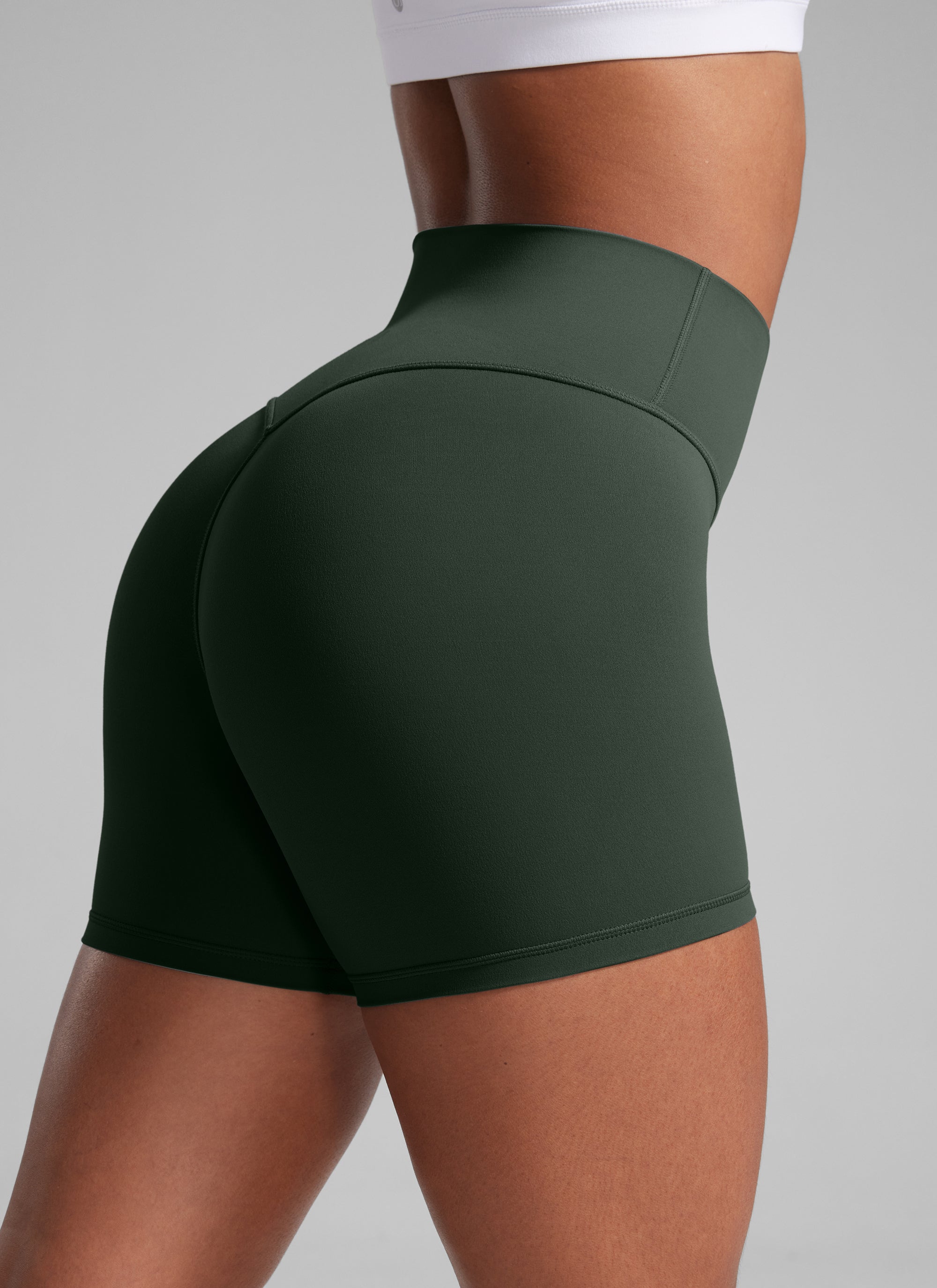 CRZ YOGA  Butterlift Leggings Cortos con el Culo Esreujado de 4 Pulgadas para Mujer Leyenda Verde