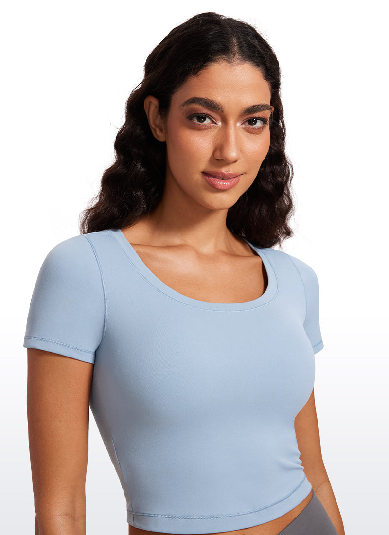 CRZ YOGA Camiseta Cropped de Manga Corta con Escote Redondeado Mujer Batista Azul