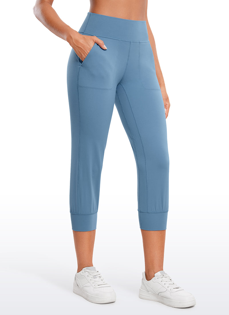 CRZ YOGA Mujeres Joggers Alta Cintura con Bolsillos de 23 pulg. Universo Azul