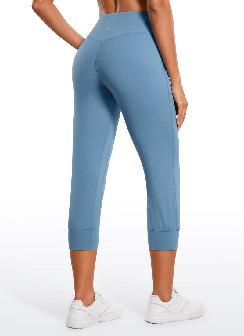CRZ YOGA Mujeres Joggers Alta Cintura con Bolsillos de 23 pulg. Universo Azul