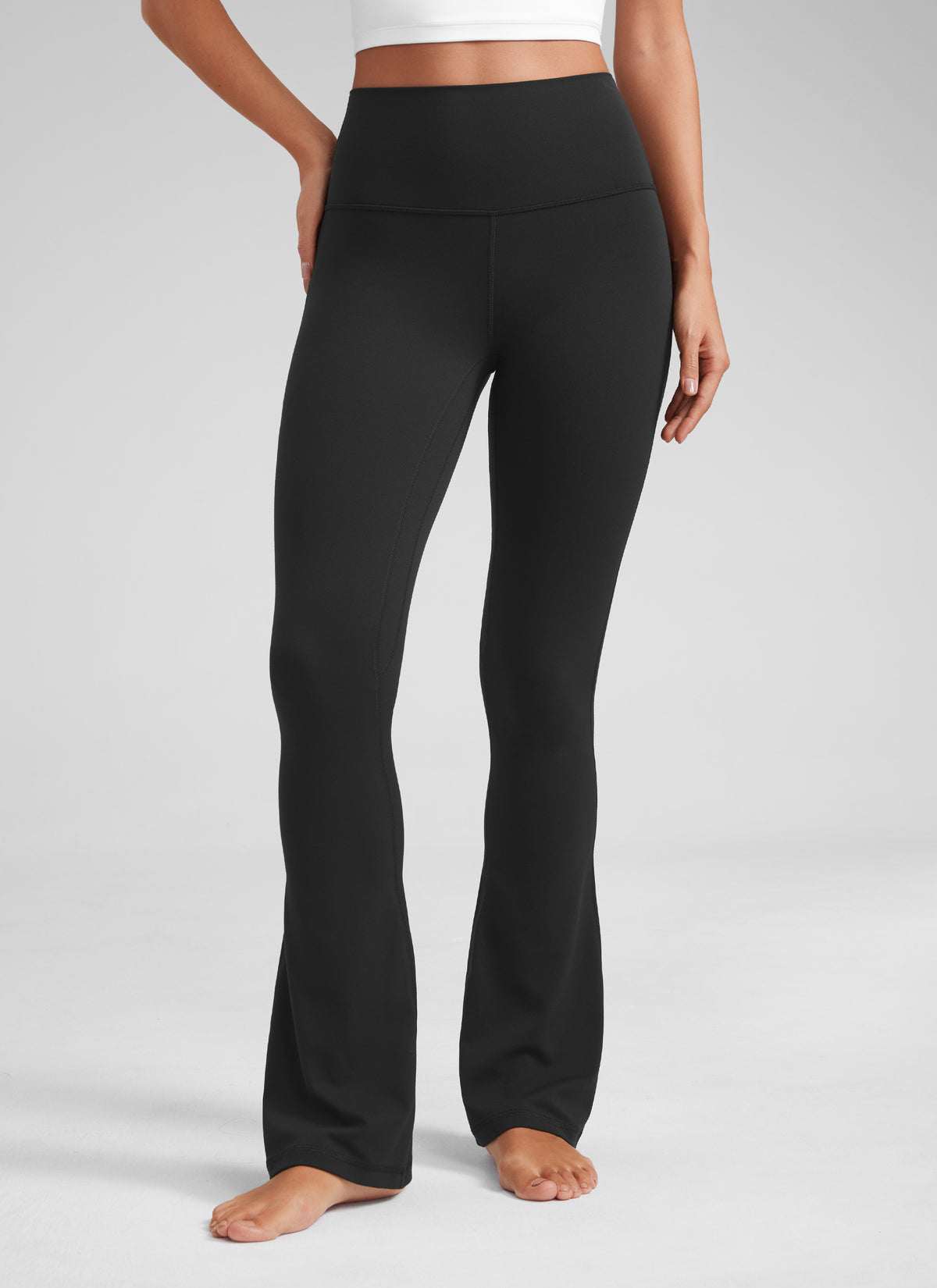 CRZ YOGA Leggings mini acampanados con bolsillos para mujer Negro