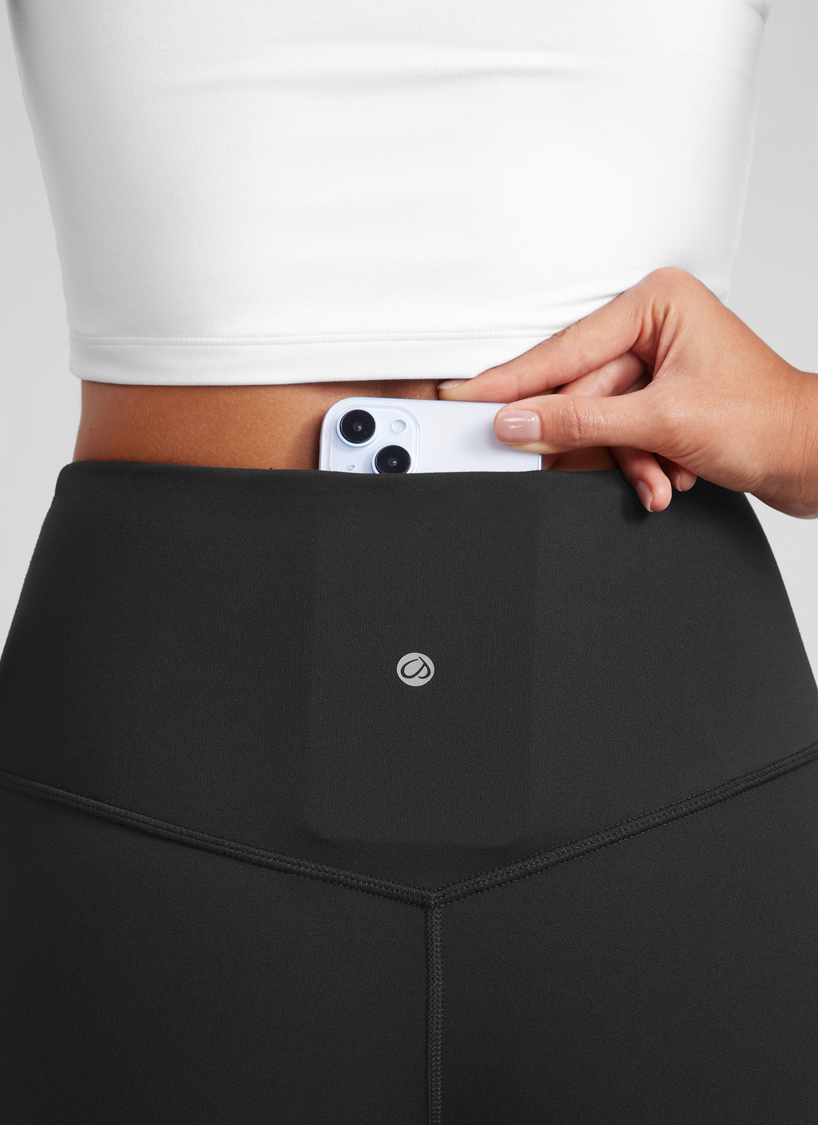 CRZ YOGA Leggings mini acampanados con bolsillos para mujer Negro