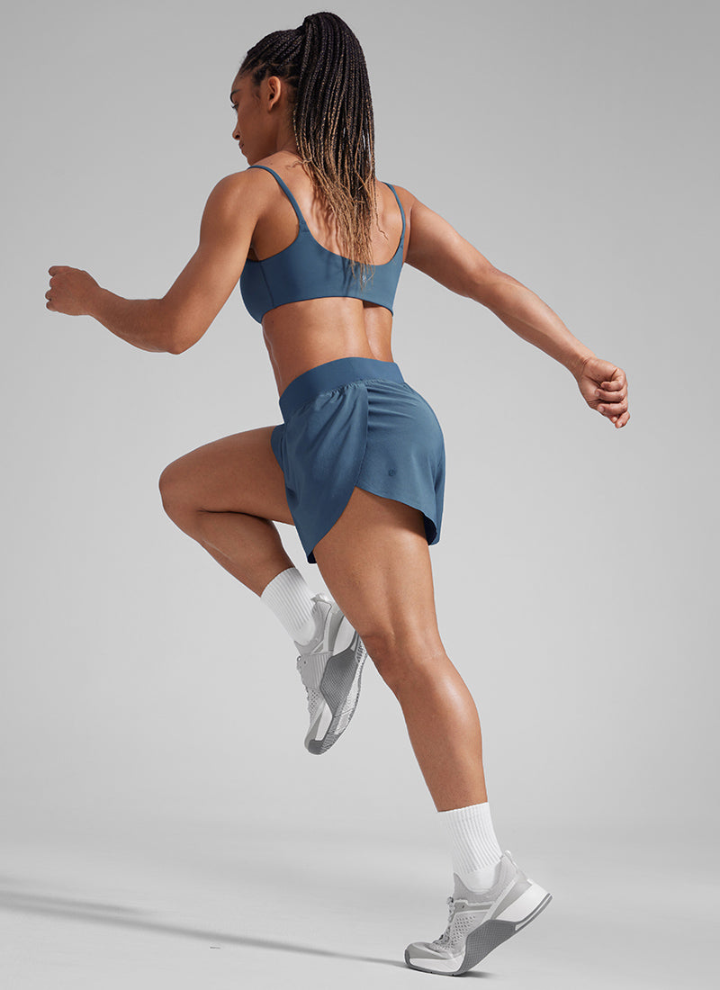 CRZ YOGA Feathery Fit Suave Shorts Forro Dolphin de Cintura Media de 4 Pulgadas para Mujer Stelindigo