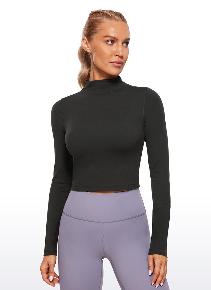 CRZ YOGA Mujer Top Slim Fit de Manga Larga Cropped y Cuello Alto Negro