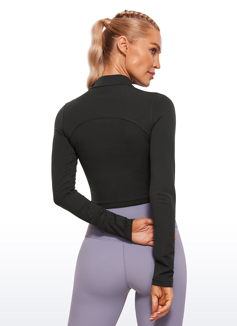 CRZ YOGA Mujer Top Slim Fit de Manga Larga Cropped y Cuello Alto Negro