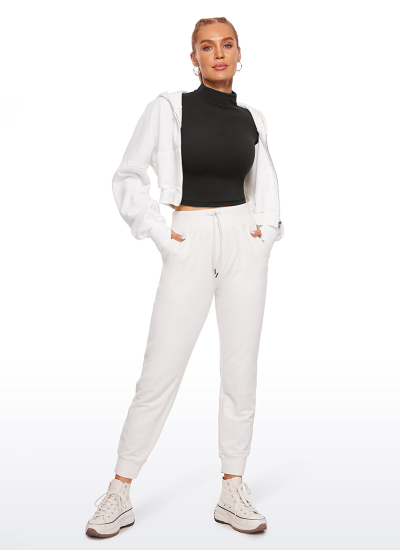 CRZ YOGA Mujer Top Slim Fit de Manga Larga Cropped y Cuello Alto Negro