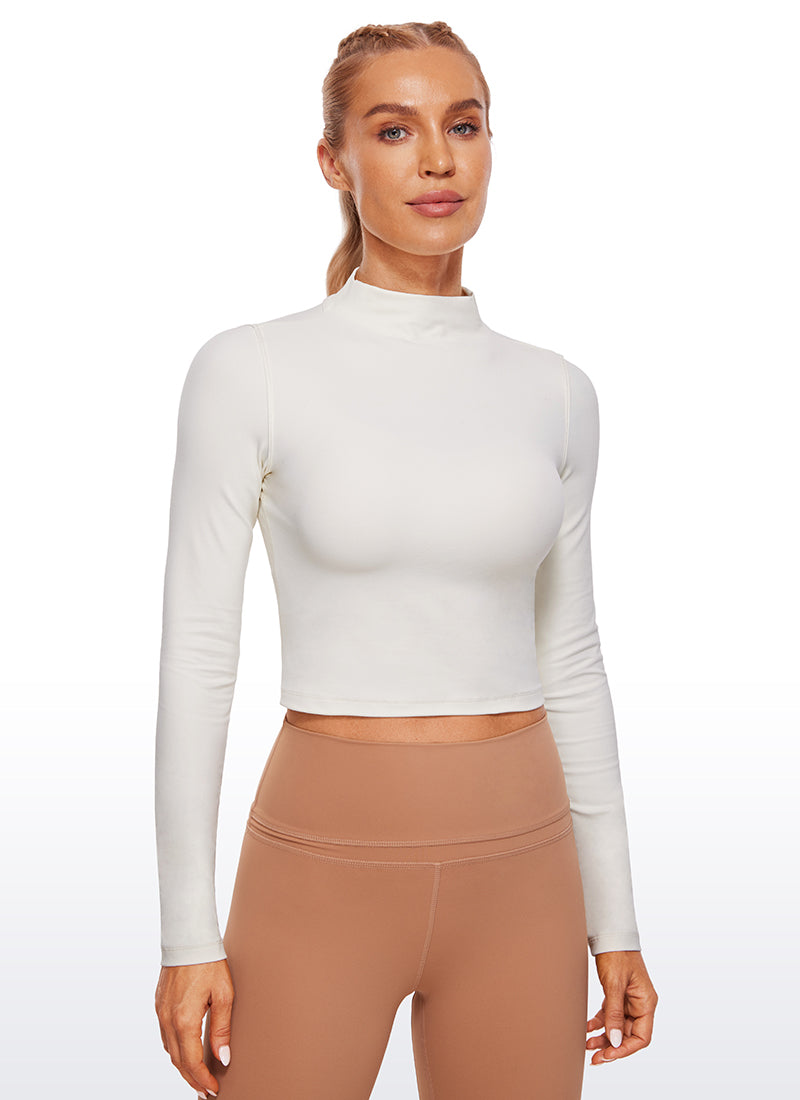 CRZ YOGA Mujer Top Slim Fit de Manga Larga Cropped y Cuello Alto Albaricoque blanco