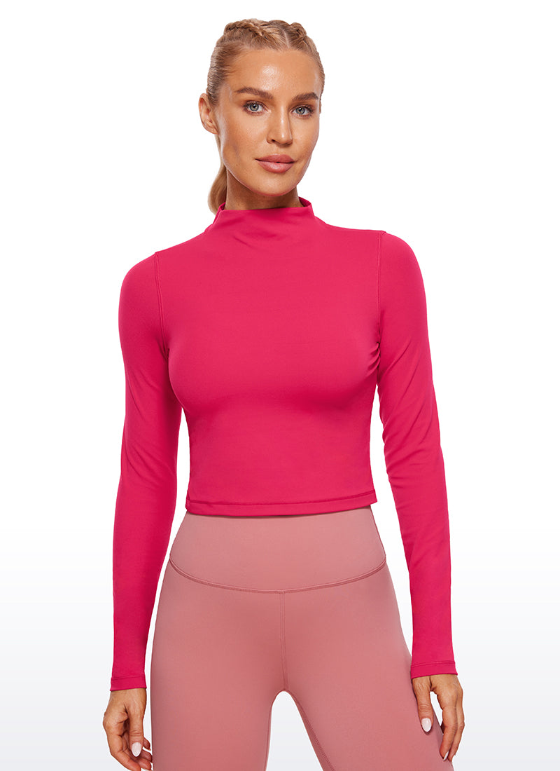 CRZ YOGA Mujer Top Slim Fit de Manga Larga Cropped y Cuello Alto Viva Magenta