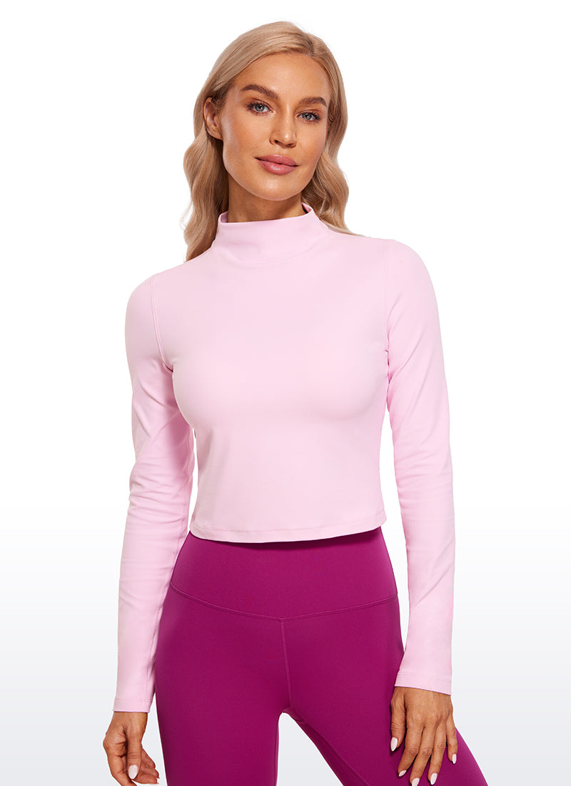 CRZ YOGA Mujer Top Slim Fit de Manga Larga Cropped y Cuello Alto Peonía Rosa