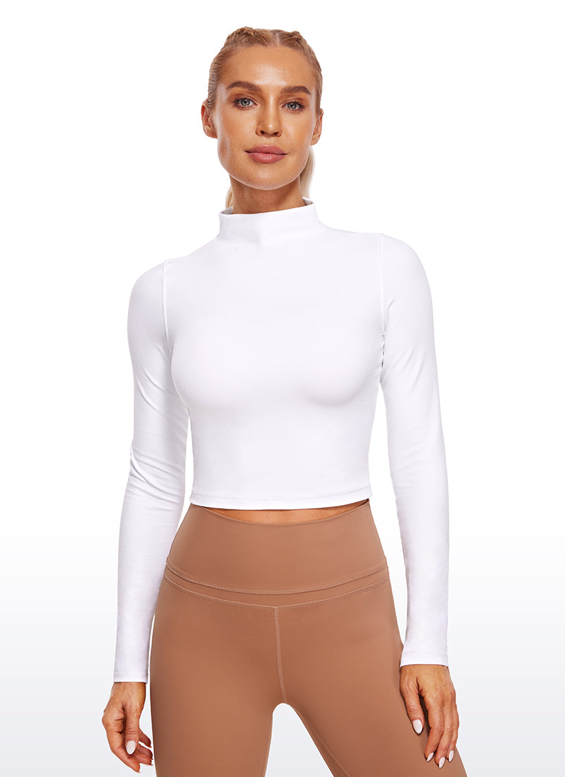 CRZ YOGA Mujer Top Slim Fit de Manga Larga Cropped y Cuello Alto blanco